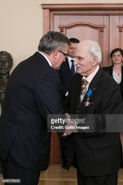 President Bronislaw Komorowski honours Anatol Swiecicki during his state visit on April 8, 2015 in Kiev, Ukraine. President Komorowski is on a...