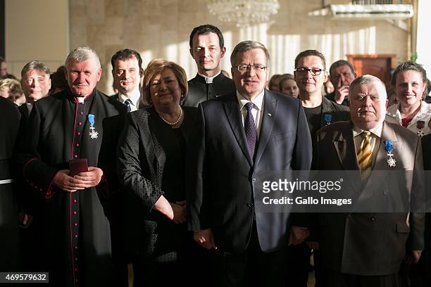 Bronislaw Komorowski with his wife Anna Komorowska pose for a picture with Jozef Pawluk and Adolf Kondracki during his state visit on April 8, 2015...