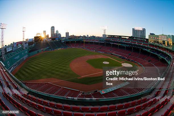 General view as the sun rises over Fenway Park before a home opening game between the Boston Red Sox and the Washington Nationals in Boston,...