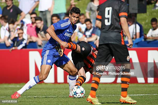 Ruben Loftus-Cheek of Chelsea FC fights for the ball with Oleksandr Zubkov of Shakhtar Donetsk during the UEFA Youth League Final match between...