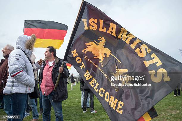 Supporters of the German anti-Islam movement Pegida gather for another weekly demonstration on April 13, 2015 in Dresden, Germany. A large number of...