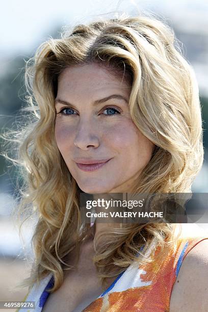 Actress Elizabeth Mitchell poses during a photocall for the serie "Crossing Lines - The time is now - Season III" during the MIPTV in Cannes, on the...