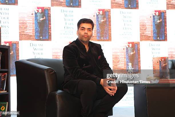Indian filmmaker Karan Johar at the launch of book Dream With Your Eyes Open by Indian entrepreneur Ronnie Screwvala on April 8, 2015 in New Delhi,...
