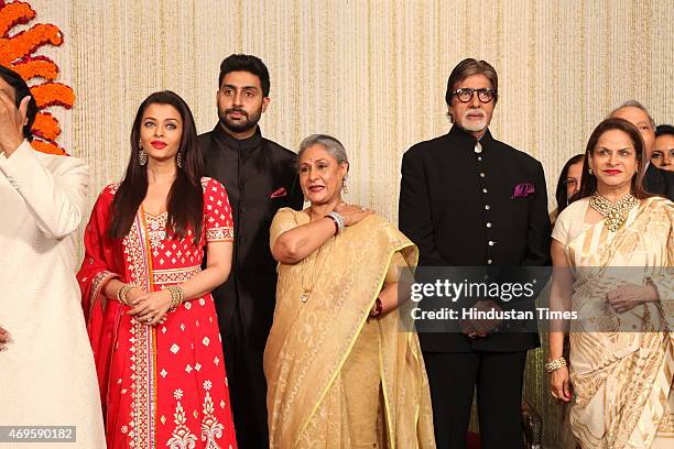 Newlywed couple Kunal Kapoor and Naina Bachchan pose with Brides uncle and Bollywood actor Amitabh Bachchan, his wife Jaya Bachchan, son Abhishek...