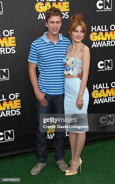 Actress Bella Thorne and Tristan Klier attend Cartoon Network's Hall of Game Awards at Barker Hangar on February 15, 2014 in Santa Monica, California.