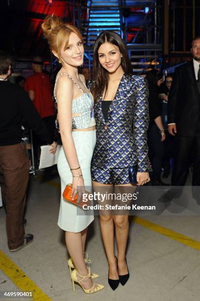 Actresses Bella Thorne and Victoria Justice attend Cartoon Network's fourth annual Hall of Game Awards at Barker Hangar on February 15, 2014 in Santa...