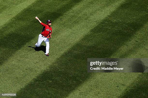 Junichi Tazawa of the Boston Red Sox warms up before the game against the Washington Nationals at Fenway Park on April 13, 2015 in Boston,...