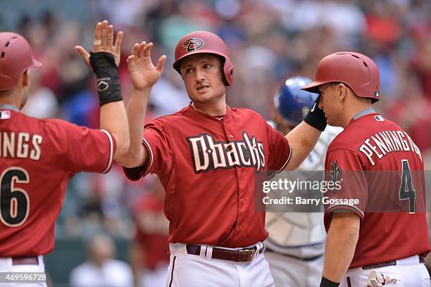 Jordan Pacheco of the Arizona Diamondbacks scores a run during the game against the Los Angeles Dodgers at Chase Field on Sunday, April 12, 2015 in...
