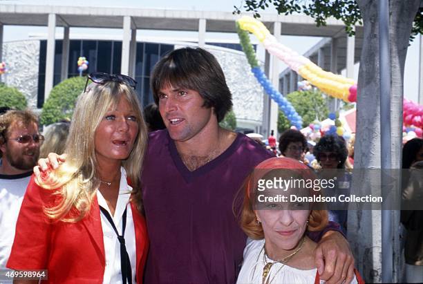 Athlete turned actor Bruce Jenner and co-star Valerie Perrine pose with actress and director Nancy walker at a promotional event for the film 'Can't...