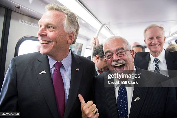 Gov. Terry McAuliffe, D-Va., left, and Rep. Gerald Connolly, D-Va., talk as they ride the new 7000-series train during the Washington Metropolitan...