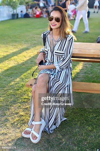 Jamie Chung wears Teva Flatform Universal Sandals to the 2015 Coachella Valley Music Festival at the Empire Polo Fields on April 12, 2015 in Indio,...