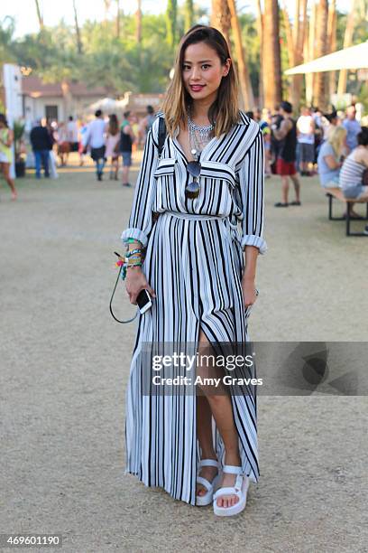 Jamie Chung wears Teva Flatform Universal Sandals to the 2015 Coachella Valley Music Festival at the Empire Polo Fields on April 12, 2015 in Indio,...