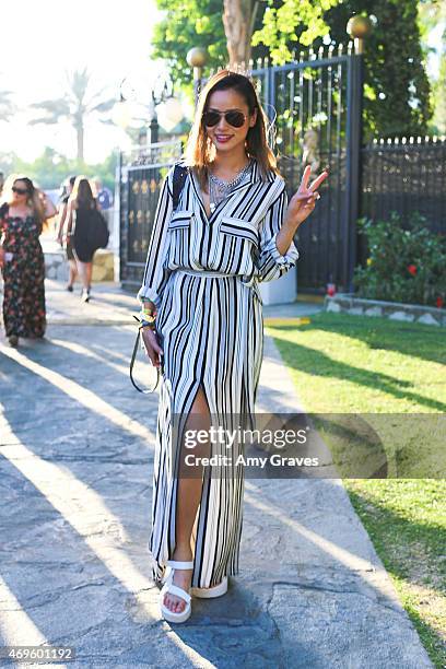 Jamie Chung wears Teva Flatform Universal Sandals to the 2015 Coachella Valley Music Festival at the Empire Polo Fields on April 12, 2015 in Indio,...