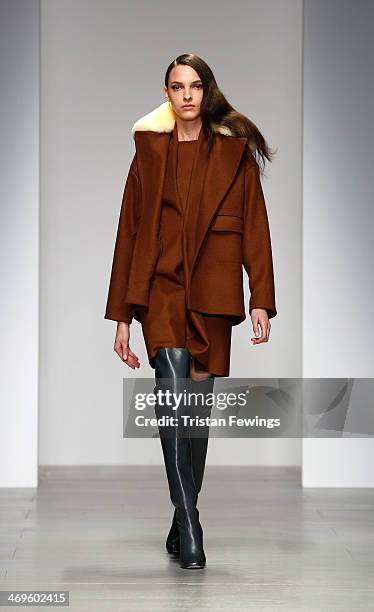 Model walks the runway at the Lucas Nascimento show at London Fashion Week AW14 at Somerset House on February 15, 2014 in London, England.