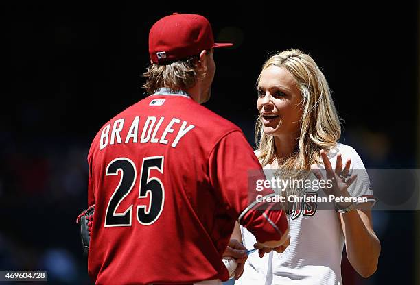 Former college softball All-American from the University of Arizona and a Team USA Olympian Jennie Finch talks with Archie Bradley of the Arizona...