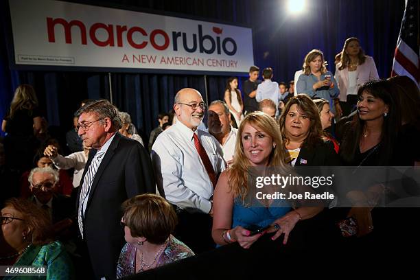 People wait for the arrival of U.S. Sen. Marco Rubio who is expected to announce his candidacy for the Republican presidential nomination during an...