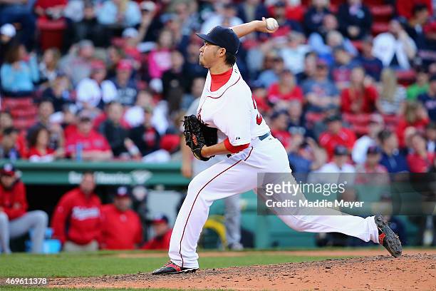 Junichi Tazawa of the Boston Red Sox throws a pitch against the Washington Nationals during the ninth inning at Fenway Park on April 13, 2015 in...