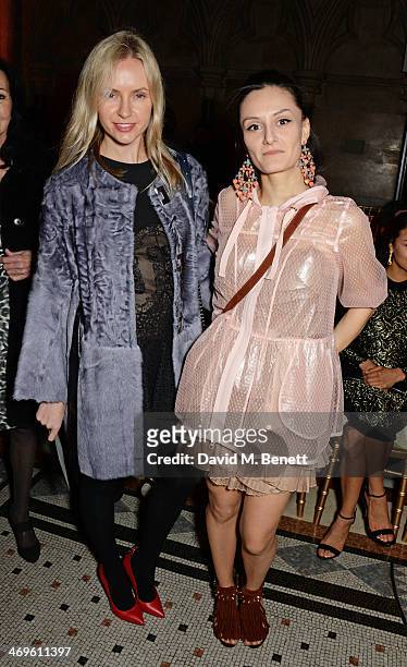 Nadya Abela and Aytan Eldarova attend the Julien Macdonald show at London Fashion Week AW14 at the Royal Courts of Justice, Strand on February 15,...