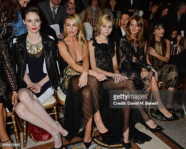 Coco Rocha, Abbey Clancy, Nina Nesbitt, Millie Mackintosh and Zara Martin attend the Julien Macdonald show at London Fashion Week AW14 at the Royal...