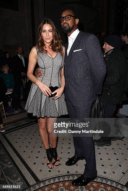 Lisa Snowdon and Tim Wade attend the Julien Macdonald show at London Fashion Week AW14 at on February 15, 2014 in London, England.