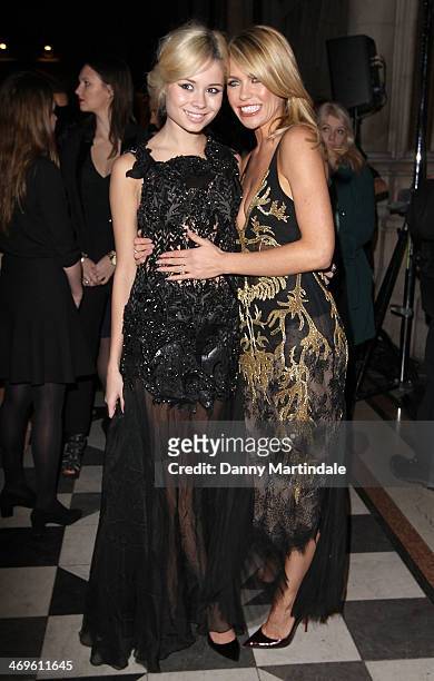 Nina Nesbitt and Abbey Clancy attend the Julien Macdonald show at London Fashion Week AW14 at on February 15, 2014 in London, England.
