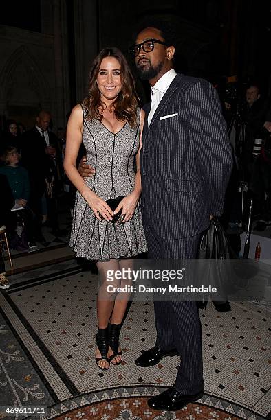 Lisa Snowdon and Tim Wade attend the Julien Macdonald show at London Fashion Week AW14 at on February 15, 2014 in London, England.
