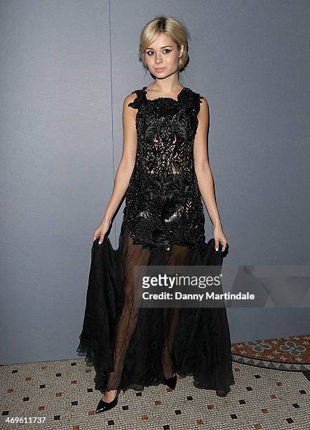 Nina Nesbitt attends the Julien Macdonald show at London Fashion Week AW14 at on February 15, 2014 in London, England.