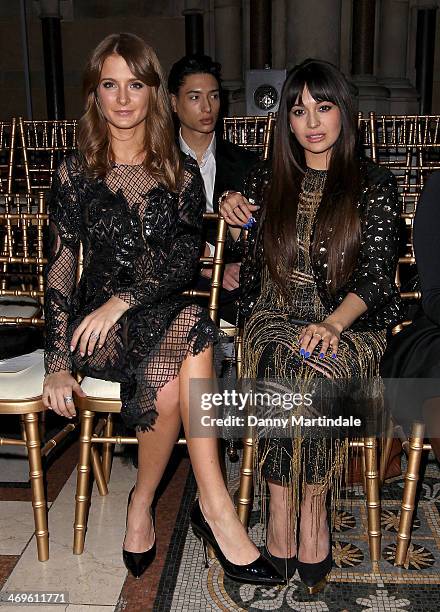 Millie Mackintosh and Zara Martin attend the Julien Macdonald show at London Fashion Week AW14 at on February 15, 2014 in London, England.