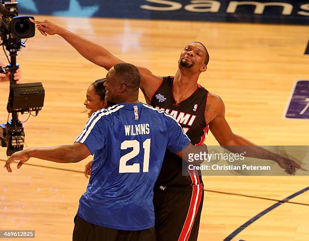Eastern Conference All-Star Chris Bosh of the Miami Heat Eastern Conference All-Star Legend Dominique Wilkins and Eastern Conference WNBA All-Star...