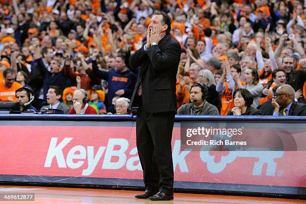 Head coach Mark Gottfried of the North Carolina State reacts to a turnover by his team late in the second half against the Syracuse Orange at the...