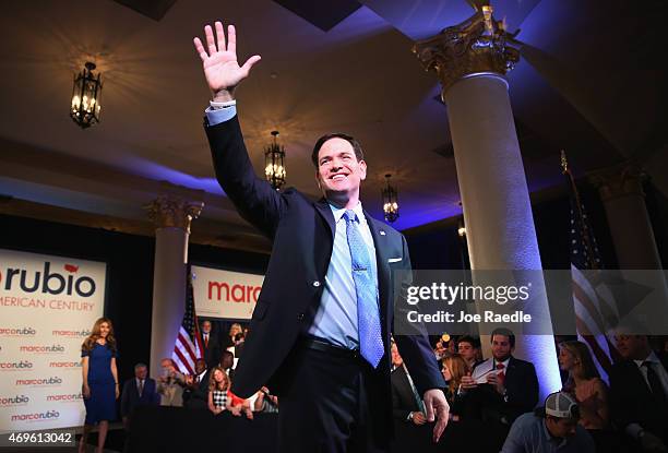 Sen. Marco Rubio waves to supporters after announcing his candidacy for the Republican presidential nomination during an event at the Freedom Tower...