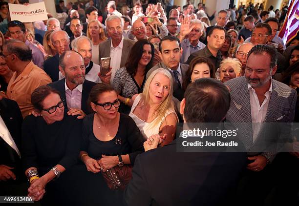 Sen. Marco Rubio greets people after announcing his candidacy for the Republican presidential nomination during an event at the Freedom Tower on...