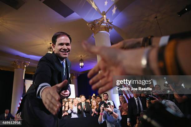 Sen. Marco Rubio greets people after anounncing his candidacy for the Republican presidential nomination during an event at the Freedom Tower on...