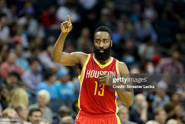 James Harden of the Houston Rockets comes back into the game against the Charlotte Hornets during their game at Time Warner Cable Arena on April 13,...