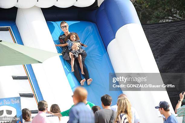 Heidi Klum and Lou Samuel are seen at the Mr. Bones pumpkin patch on October 06, 2012 in Los Angeles, California.