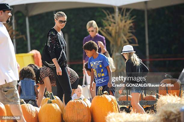 Heidi Klum with her children Leni Samuel, Henry Samuel and Lou Samuel are seen at the Mr. Bones pumpkin patch on October 06, 2012 in Los Angeles,...
