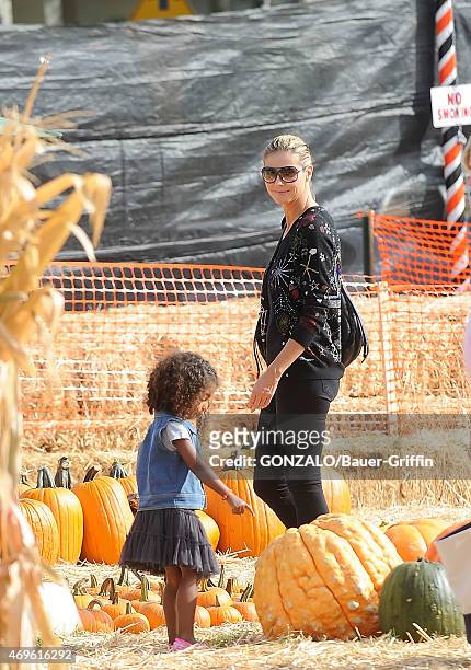 Heidi Klum and Lou Samuel are seen at the Mr. Bones pumpkin patch on October 06, 2012 in Los Angeles, California.