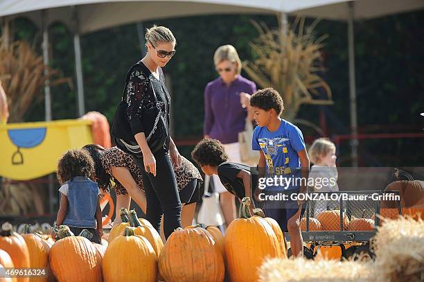 Heidi Klum with her children Henry Samuel, Johan Samuel and Lou Samuel are seen at the Mr. Bones pumpkin patch on October 06, 2012 in Los Angeles,...