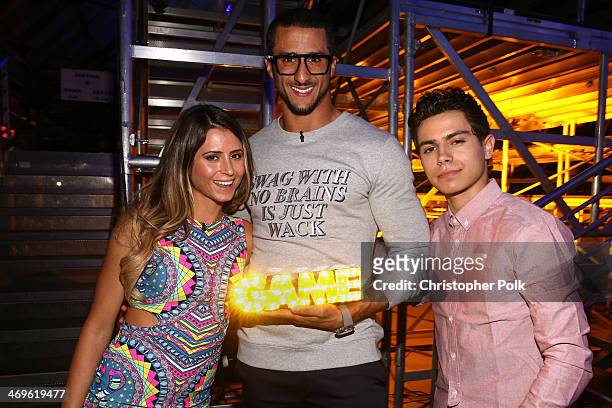 Surfer Anastasia Ashley, co-host Colin Kaepernick with his I Got Swag award, and actor Jake T. Austin attend Cartoon Network's fourth annual Hall of...