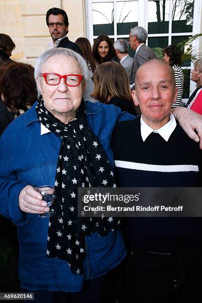 Actor Roger Dumas and his wife attend Museum Paul Belmondo celebrates its 5th Anniversary on April 13, 2015 in Boulogne-Billancourt, France.