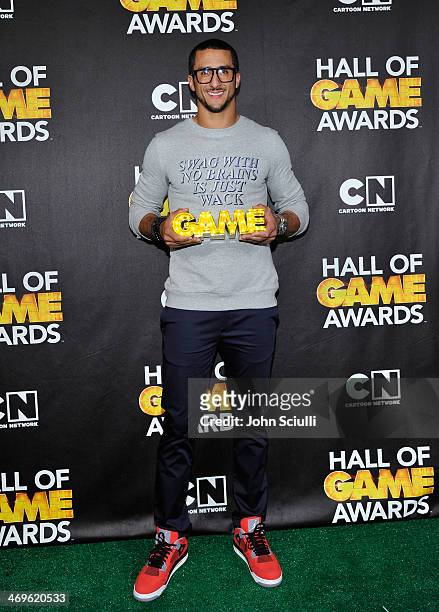 Quarterback Colin Kaepernick of the San Francisco 49ers poses in the press room during Cartoon Network's fourth annual Hall of Game Awards at Barker...