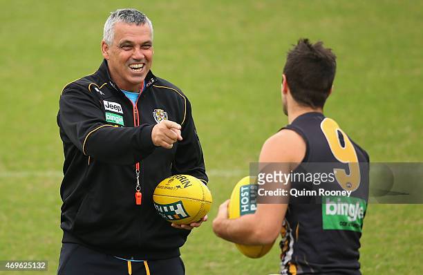 Mark Williams the assistant coach of the Tigers has a laugh with Trent Cotchin during a Richmond Tigers AFL training session at ME Bank Centre on...