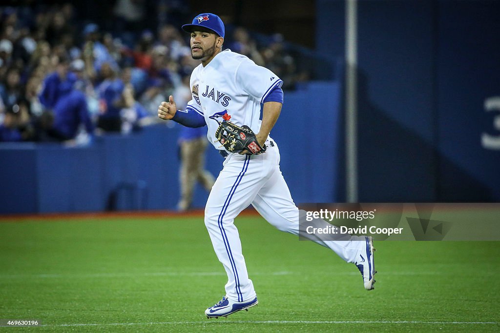 Devon Travis (29) of the Toronto Blue Jays takes the throw to force Logan Forsythe (11) of the Tampa Bay Rays out at 2nd to end the top of the 8th