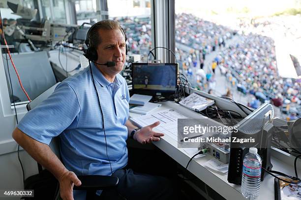 Broadcaster Glen Kuiper Jr. Of the Oakland Athletics works from the pressbox during the game against the Chicago White Sox at Hohokam Stadium on...