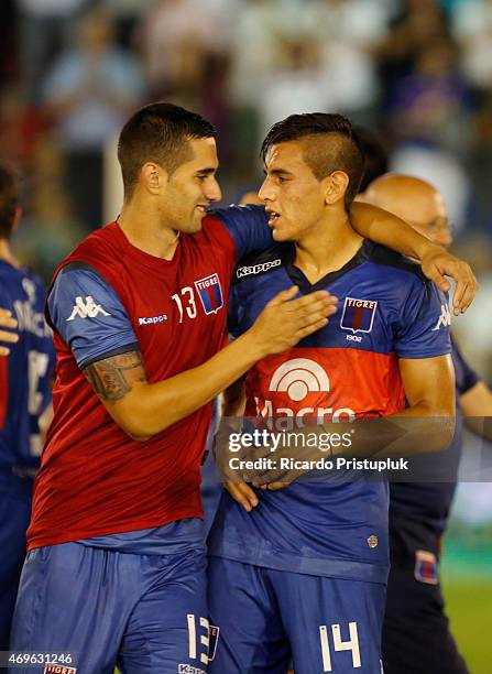 Fernando Lugo and Alexis Castro of Tigre celebrate after a match between Tigre and Estudiantes as part of 9th round of Torneo Primera Division at...