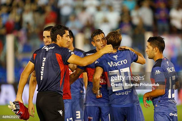 Players of Tigrecelebrate after winning a match between Tigre and Estudiantes as part of 9th round of Torneo Primera Division at Jose Dellagiovanna...