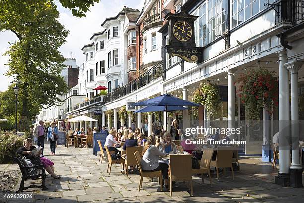 Street scene at The Pantiles pedestrian area of Tunbridge Wells with street cafe and shops in Kent, England, UK