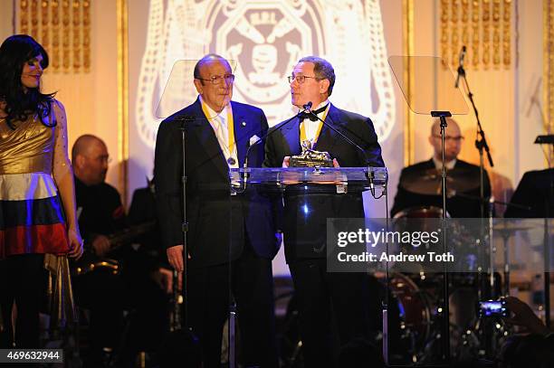 Honoree Clive Davis and Graduate Chairman of the Hasty Pudding Institute of 1770 Andrew Farkas speak on stage during The Hasty Pudding Institute of...