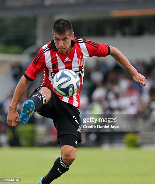 Carlos Auzqui of Estudiantes in action during a match between All Boys and Estudiantes as part of Torneo Final 2014 at Malvinas Argentinas Stadium on...