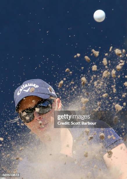 Morgan Pressel of the USA plays out of a bunker on the 2nd hole during the fourth round of the ISPS Handa Women's Australian Open at The Victoria...